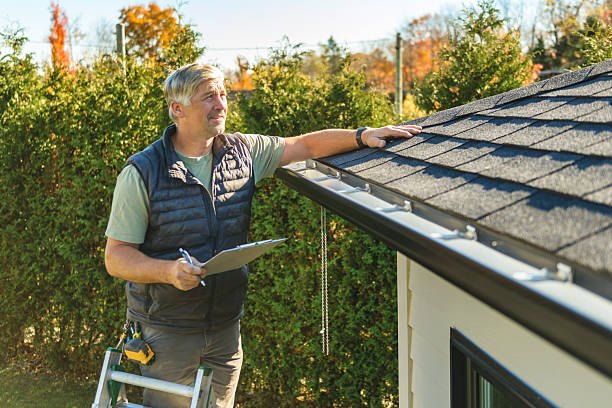 Professional Hail Damage Roof Repair technician working in Retsof, NY
